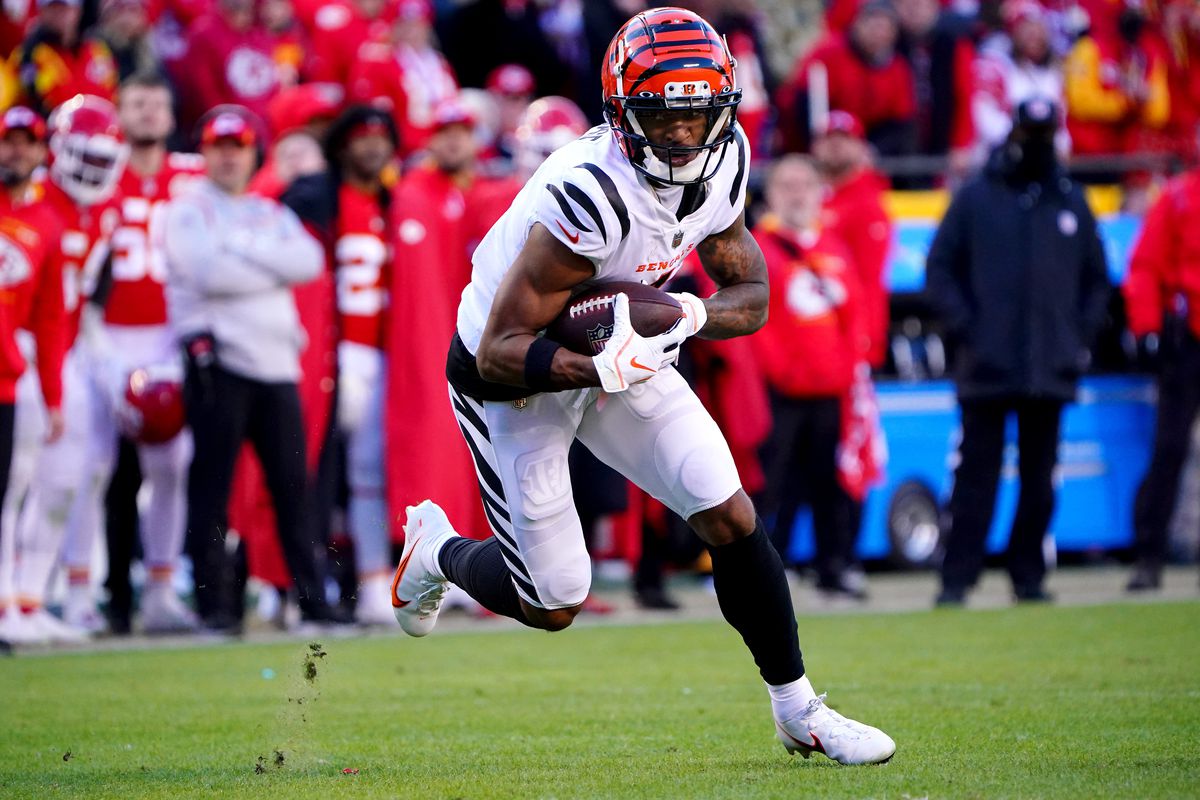 Cincinnati Bengals wide receiver Ja’Marr Chase (1) turns downfield after a catch in the third quarter during the AFC championship NFL football game against the Kansas City Chiefs, Sunday, Jan. 30, 2022, at GEHA Field at Arrowhead Stadium in Kansas City, Mo.