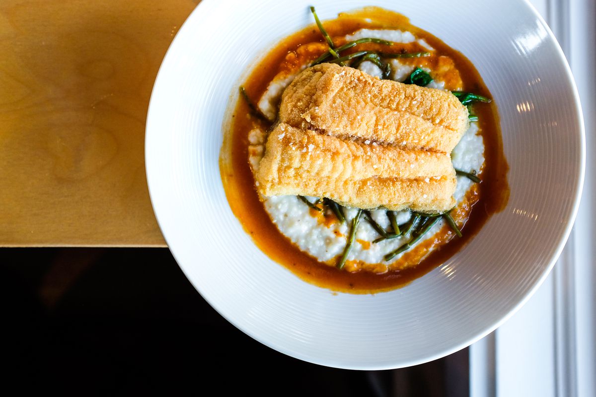 A bird’s eye view of the catfish and grits at JuneBaby, one of Seattle’s most vibrant restaurants.