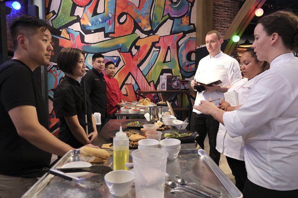 Vietnamese chef Christine Ha speaks with “Top Chef: Houston” contestants Jackson Kalb, Evelyn Garcia, and Sarah Welch.