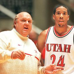 Utah coach Rick Majerus, left, talks strategy with point guard Andre Miller.