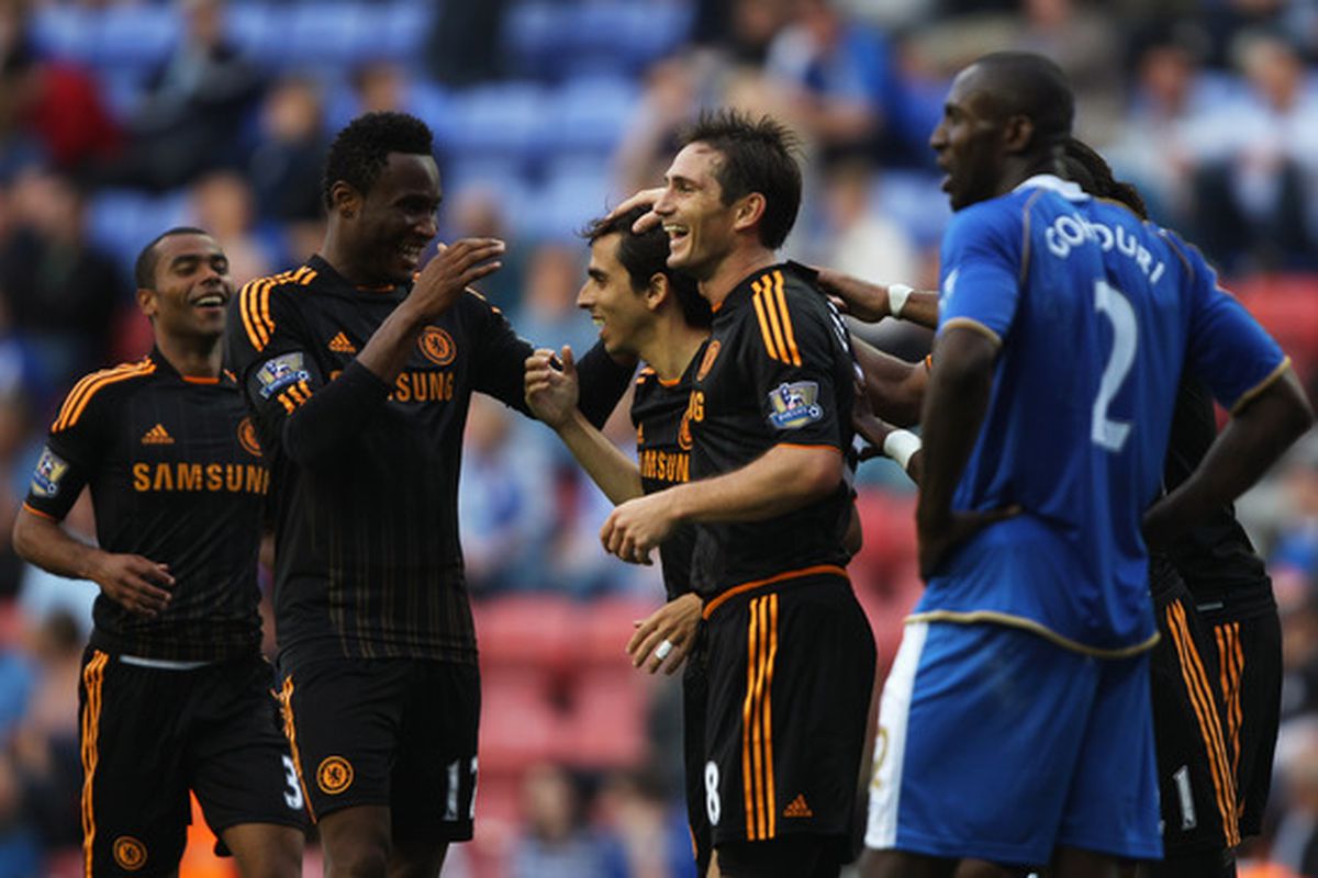 Yossi Benayoun is congratulated for opening his Chelsea account after a last-second goal against Wigan Athletic.