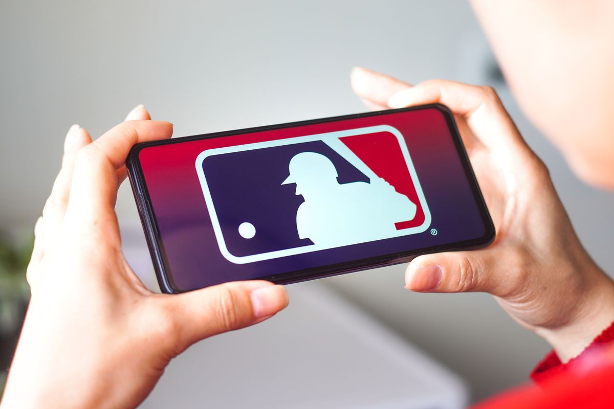 In this photo illustration, the Major League Baseball (MLB)...