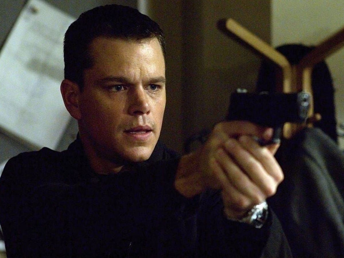 Matt Damon with a gun in The Bourne Identity