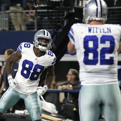 Dallas Cowboys' Dez Bryant (88) celebrates after throwing a pass for a touchdown to tight end Jason Witten (82) in the second half of an NFL football game against the Detroit Lions on Monday, Dec. 26, 2016, in Arlington, Texas. 