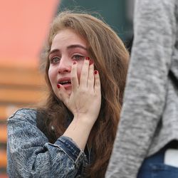 Brighton High School student Emma Cortez cries during a walkout in Cottonwood Heights on Wednesday, March 14, 2018. The demonstration honored the 17 people killed during last month's mass shooting at Marjory Stoneman Douglas High School in Parkland, Florida.