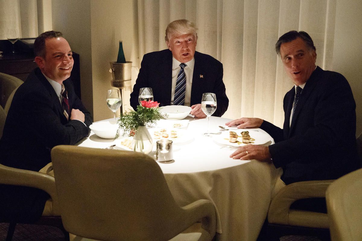 FILE "” President-elect Donald Trump, center, eats dinner with Mitt Romney, right, and Trump Chief of Staff Reince Priebus at Jean-Georges restaurant, Tuesday, Nov. 29, 2016, in New York. 