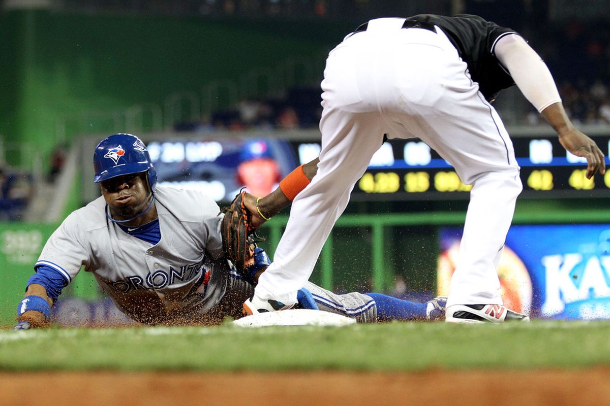 Hey look! It's Rajai stealing 3rd, let's discuss.  (Photo by Marc Serota/Getty Images)