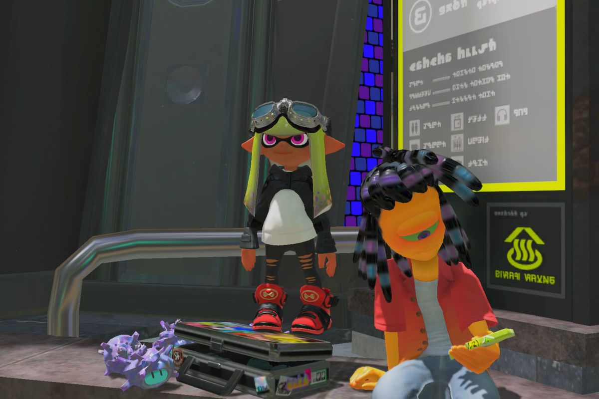 A yellow-haired inkling stands next to Murch in Splatsville