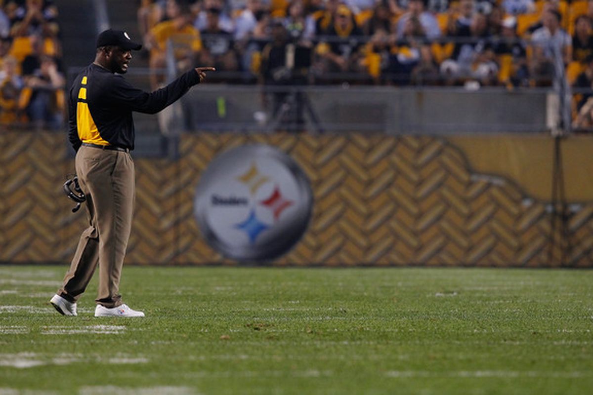 Head coach Mike Tomlin calls out orders to his offense during the preseason game against the Carolina Panthers on September 2 2010 at Heinz Field.