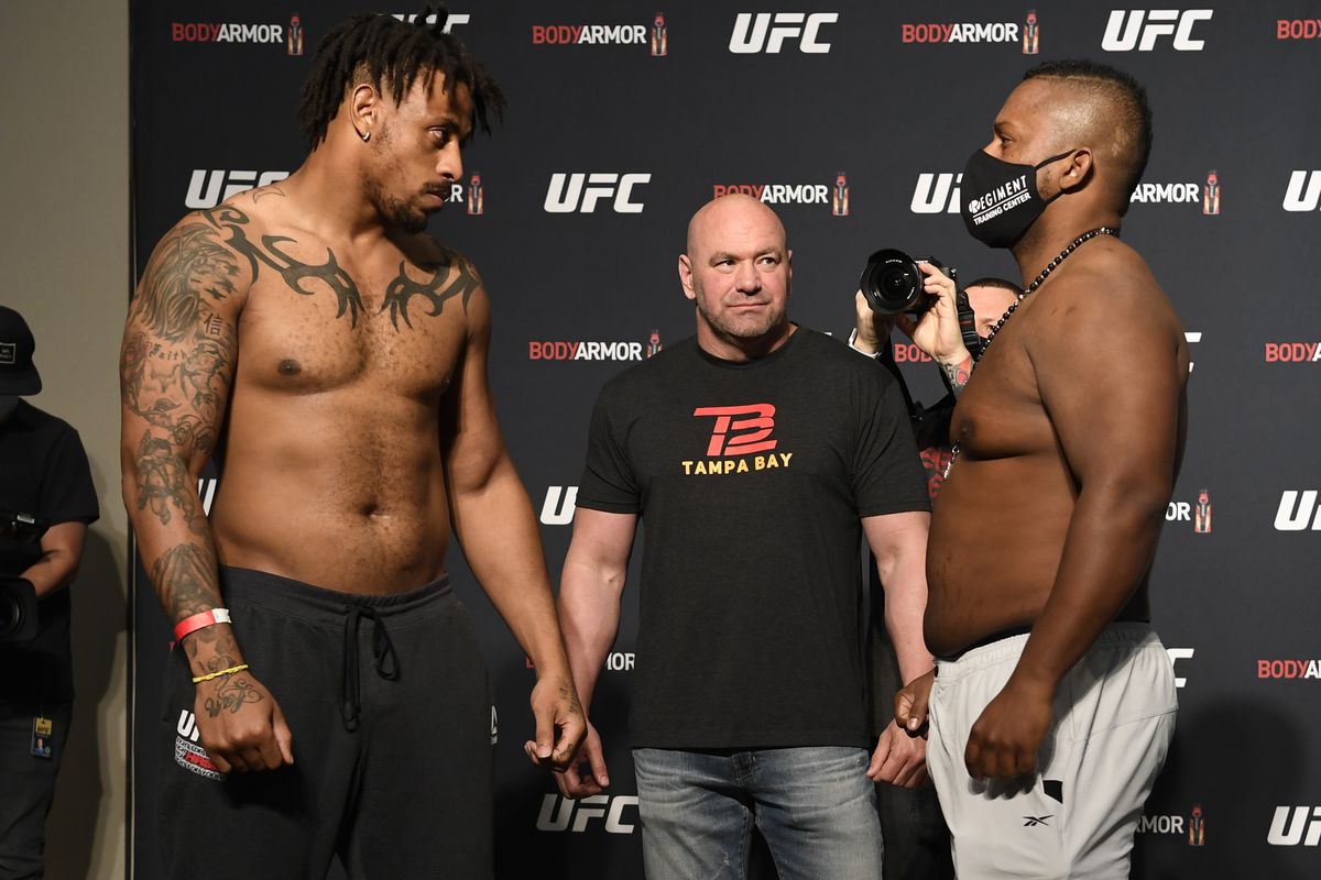 Opponents Greg Hardy and Yorgan De Castro face off during the UFC 249 official weigh-in on May 08, 2020 in Jacksonville, Florida.
