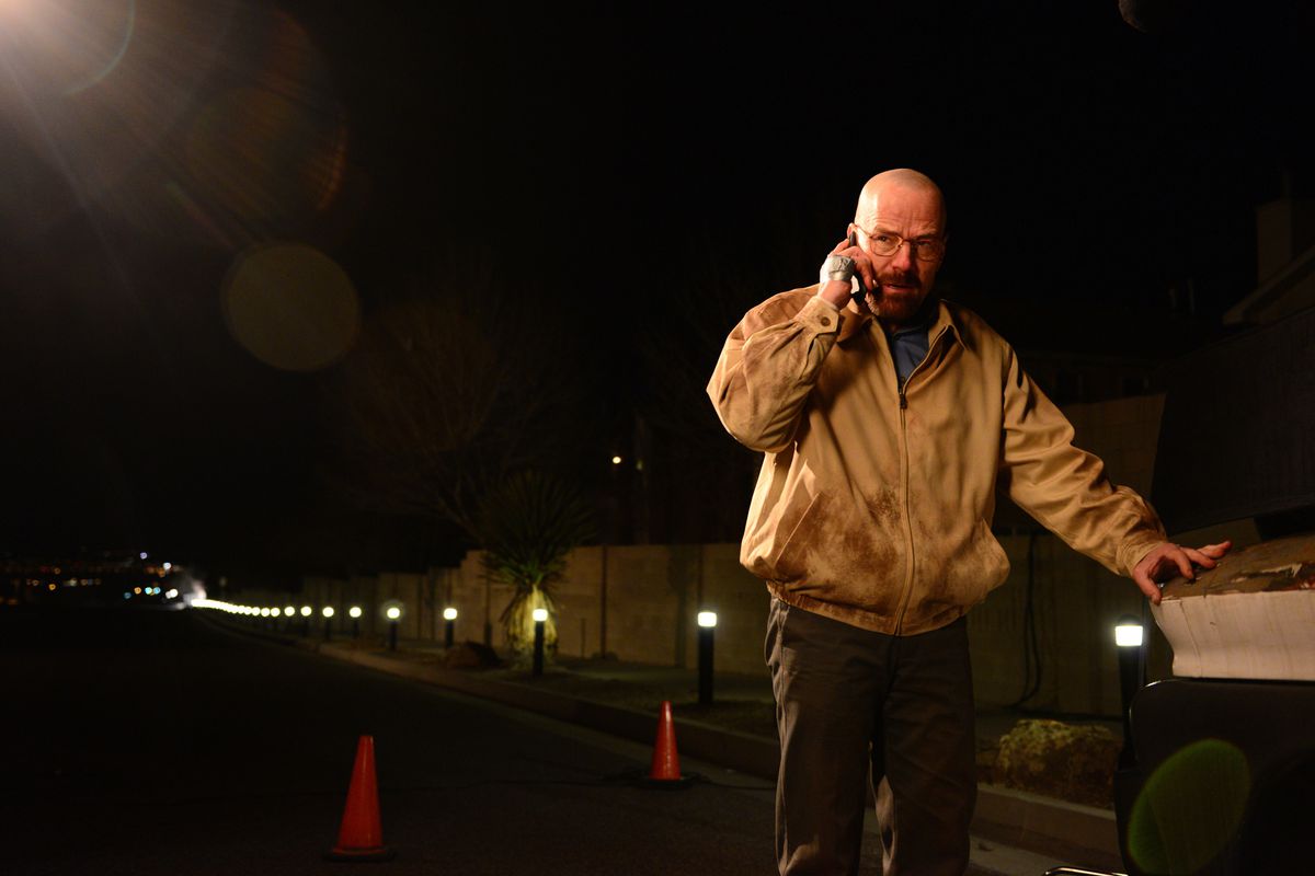 Actor Bryan Cranston as Walter White holds a phone to his ear in Breaking Bad.