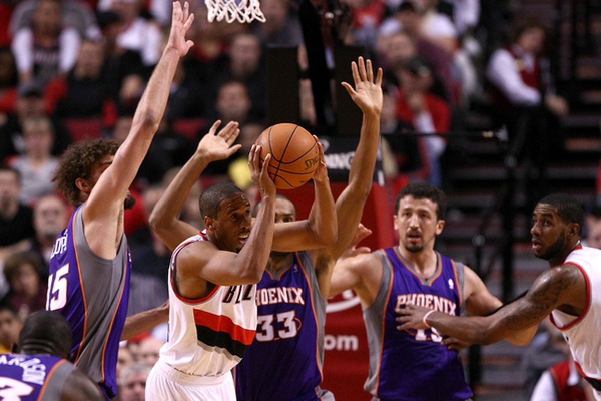 PORTLAND OR - OCTOBER 26:  Andre Miller #24 of the Portland Trail Blazers is defended by the Phoeinx Suns on October 26 2010 at the Rose Garden in Portland Oregon.  (Photo by Jonathan Ferrey/Getty Images)