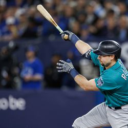 Cal Raleigh #29 of the Seattle Mariners hits a foul tip in the first inning of their MLB game against the Toronto Blue Jays at Rogers Centre on April 29, 2023 in Toronto, Canada.