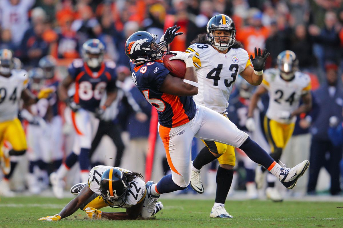 <em>TE Daniel Fells (86) of the Denver Broncos catches the ball against Troy Polamalu (43) of the Pittsburgh Steelers during the AFC Wild Card Playoff game</em>.