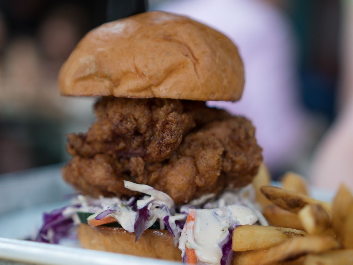 Basilisk’s fried chicken sandwiches, pickles, cabbage cole slaw and buttery buns