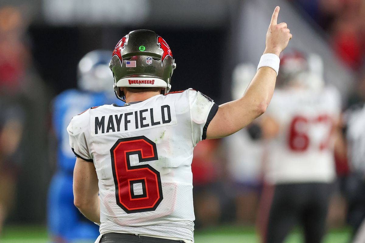 Baker Mayfield #6 of the Tampa Bay Buccaneers celebrates a touchdown pass to Mike Evans #13 against the Carolina Panthers at Raymond James Stadium on December 3, 2023 in Tampa, Florida.