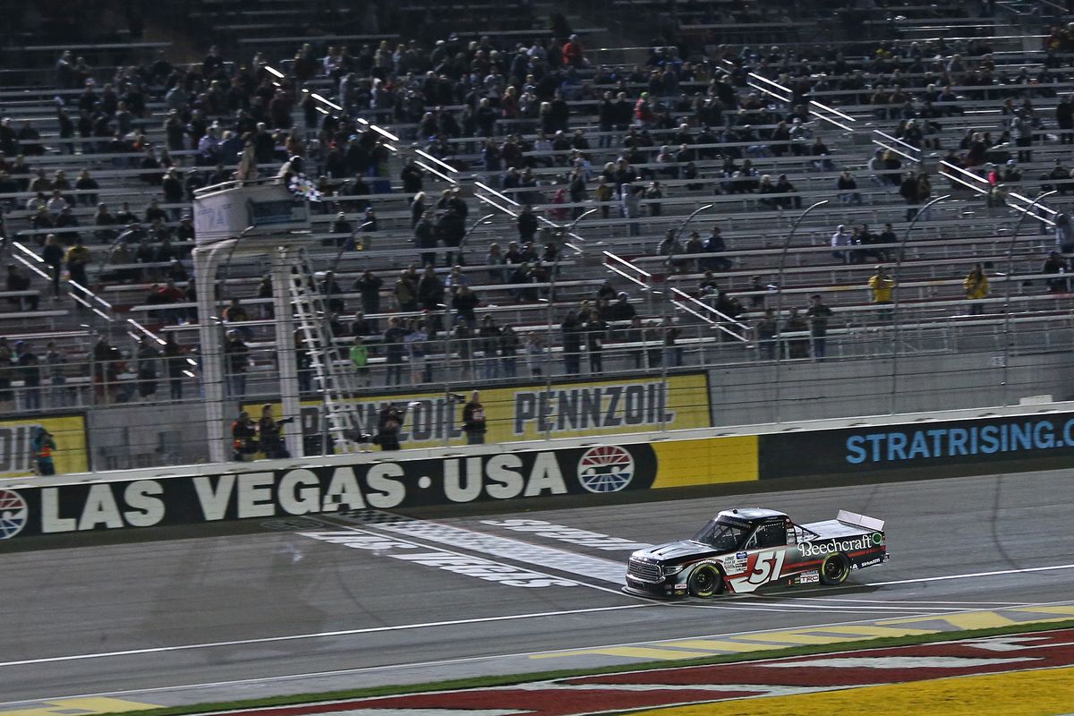 Kyle Busch, driver of the #51 Cessna Toyota, takes the checkered flag to win the NASCAR Gander RV &amp; Outdoors Truck Series Strat 200 at Las Vegas Motor Speedway on February 21, 2020 in Las Vegas, Nevada.
