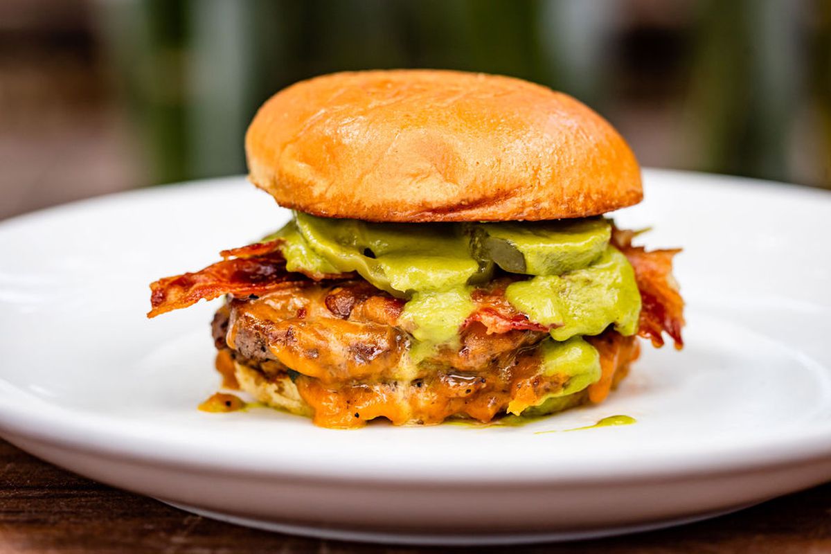 A bacon cheeseburger doused in jalapeno sauce.