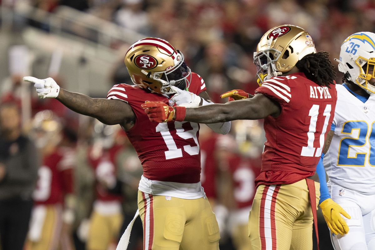San Francisco 49ers wide receiver Deebo Samuel (19) and wide receiver Brandon Aiyuk (11) celebrate a first down against the Los Angeles Chargers during the first quarter at Levi’s Stadium.