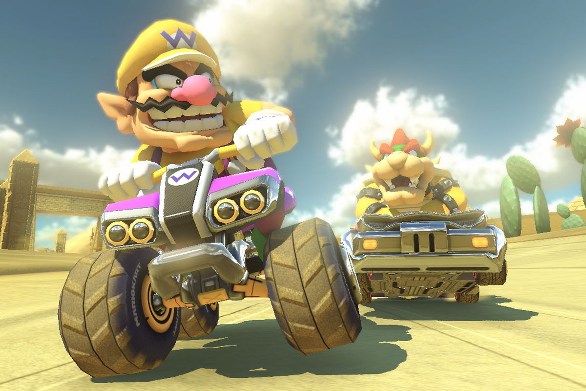 Wario and Bowser ride around in Mario Kart