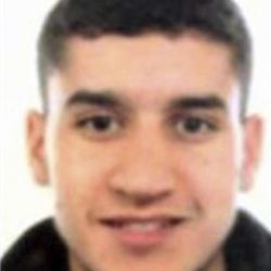 This is an undated handout photo sourced from social media of 22-year-old Younes Abouyaaquoub. Authorities in Spain and France pressed their search Saturday, Aug. 19, 2017 for the supposed ringleader of an Islamic extremist cell that carried out vehicle attacks in Barcelona and a seaside resort, as the investigation focused on links among the Moroccan members and the house where they plotted the carnage.  One of the main suspects in the attacks, Younes Abouyaaquoub, a 22-year-old Moroccan, was believed to be at large. His name figures on a police list of four main suspects sought in the attack. All the suspects on the list hail from Ripoll, a quiet, upscale town of 10,000 about 100 kilomaters north of Barcelona. (Social Media via AP)