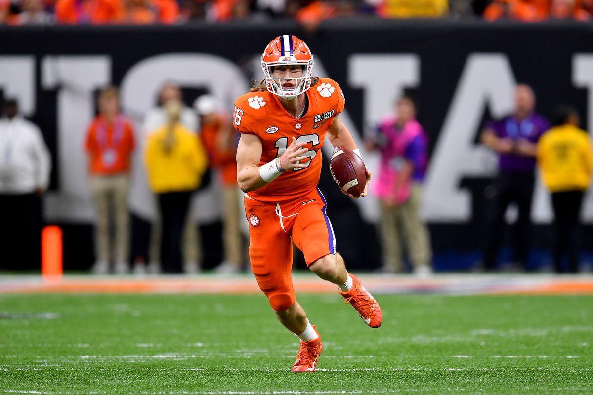 Trevor Lawrence of the Clemson Tigers runs with the ball during the fourth quarter of the College Football Playoff National Championship game against the LSU Tigers at the Mercedes Benz Superdome on January 13, 2020 in New Orleans, Louisiana.&nbsp;