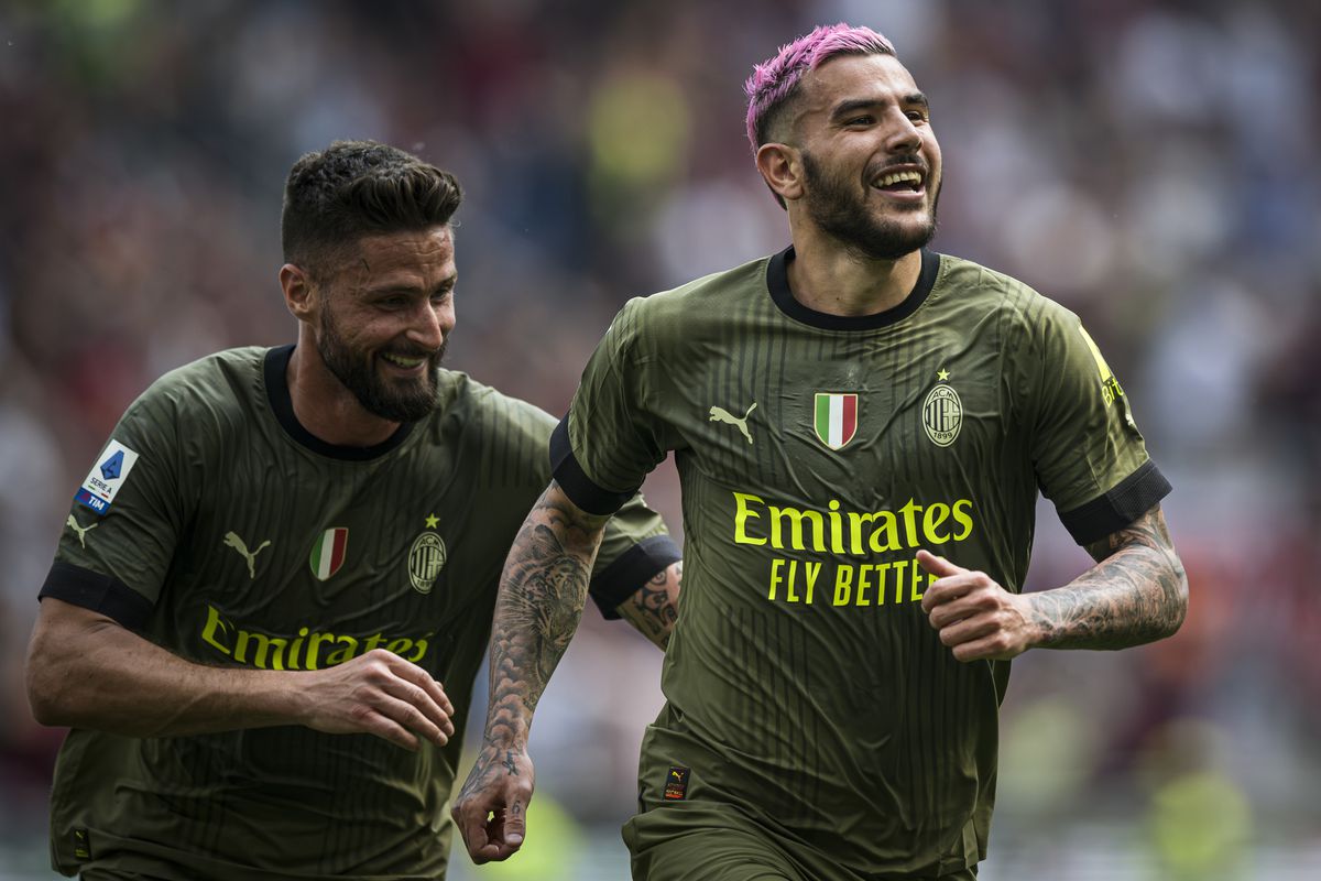 Theo Hernandez (R) of AC Milan celebrates with Olivier...