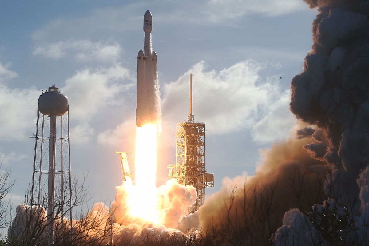 The SpaceX Falcon Heavy rocket lifts off its launch pad