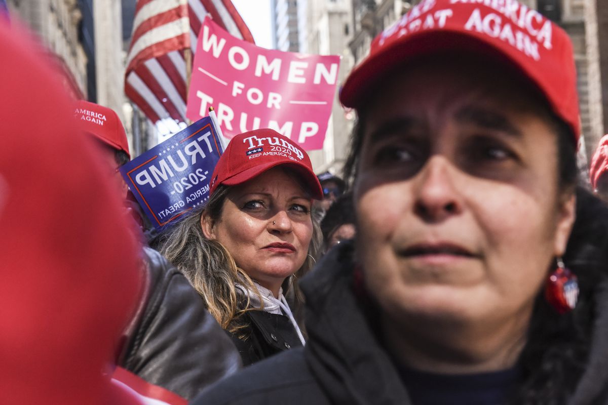 People attend a rally in support of President Trump near Trump Tower on March 23, 2019 in New York City.