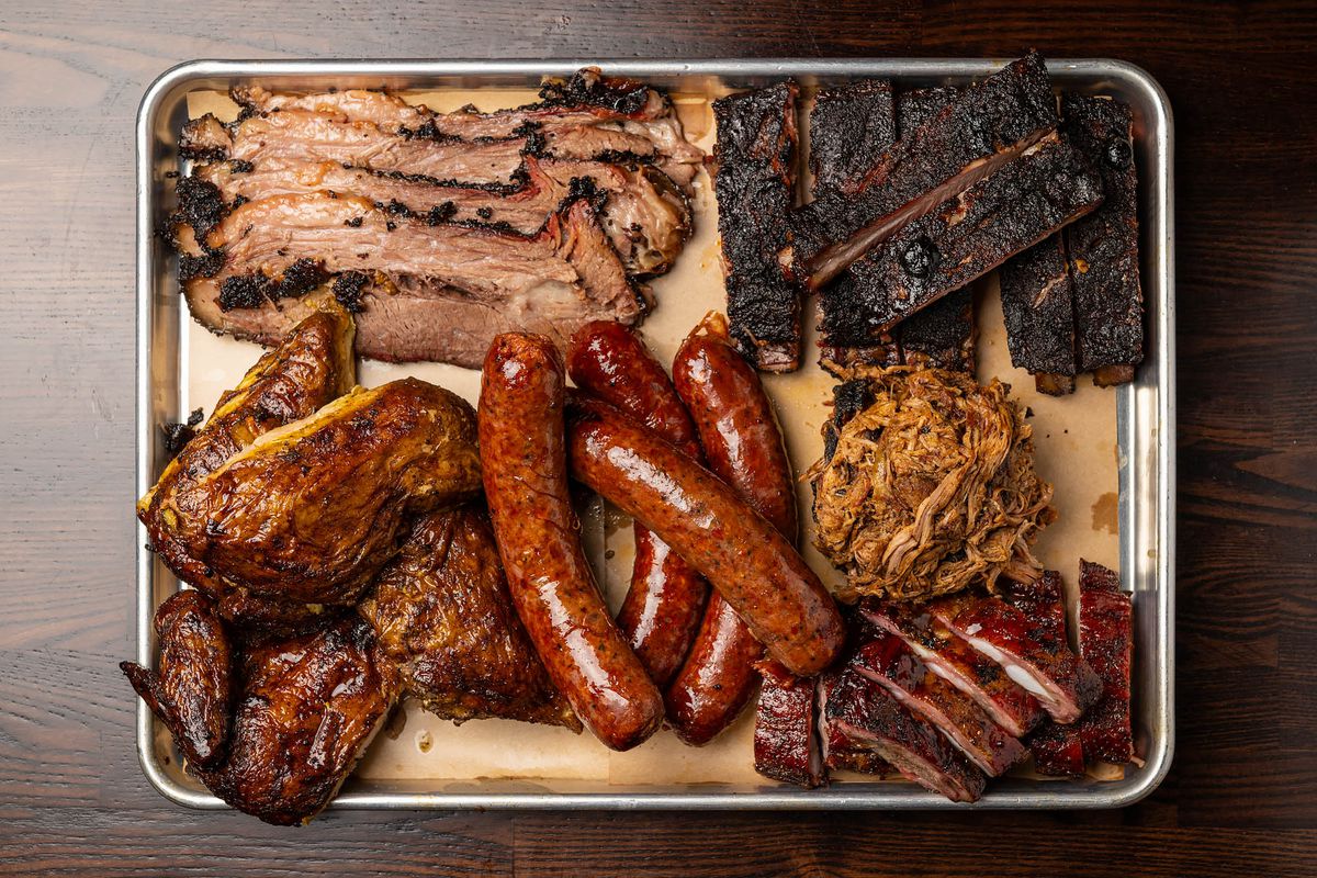 A party platter with ribs, chicken, pulled pork, and brisket at Bludso’s BBQ in Santa Monica.