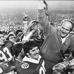 BYU head football coach LaVell Edwards is carried after winning the Holiday Bowl on Dec. 19, 1981.