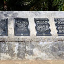 Four interpretive plaques tell about the Ha’alaufuli chapel in Vava'u, Tonga.