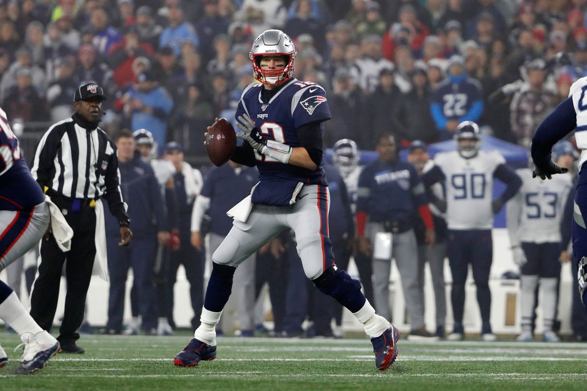 New England Patriots quarterback Tom Brady looks downfield during a playoff game against the Tennessee Titans at Gillette Stadium.