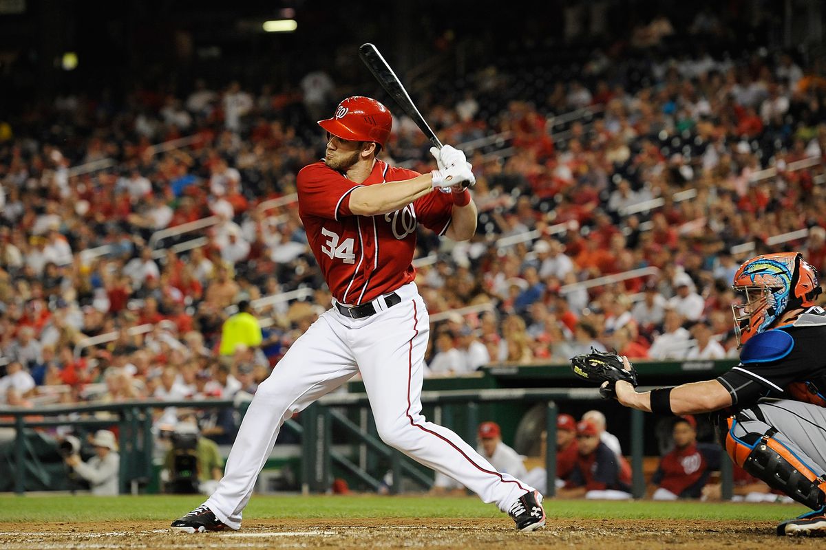 WASHINGTON, DC - AUGUST 03:  Bryce Harper #34 of the Washington Nationals hits against the Miami Marlins at Nationals Park on August 3, 2012 in Washington, DC.  (Photo by Patrick McDermott/Getty Images)