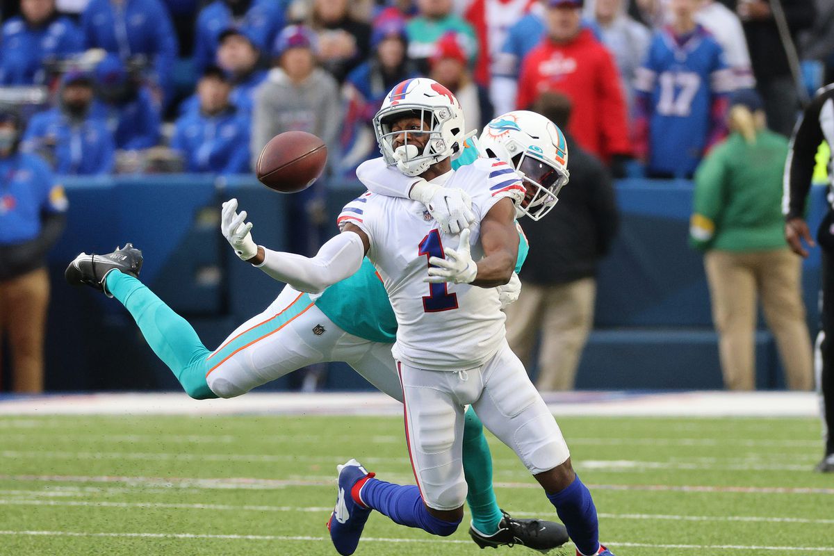 Bills receiver Emmanuel Sanders concentrates to catch this pass while defended by Miami s Byron Jones.&nbsp;