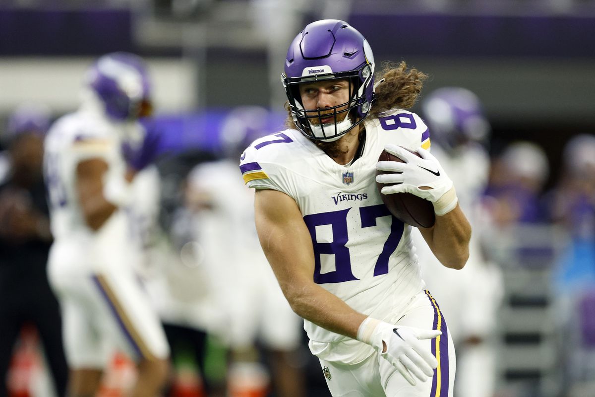 T.J. Hockenson #87 of the Minnesota Vikings warms up prior to the game against the Detroit Lions at U.S. Bank Stadium on December 24, 2023 in Minneapolis, Minnesota.