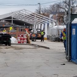 Players parking tent being put up on Waveland