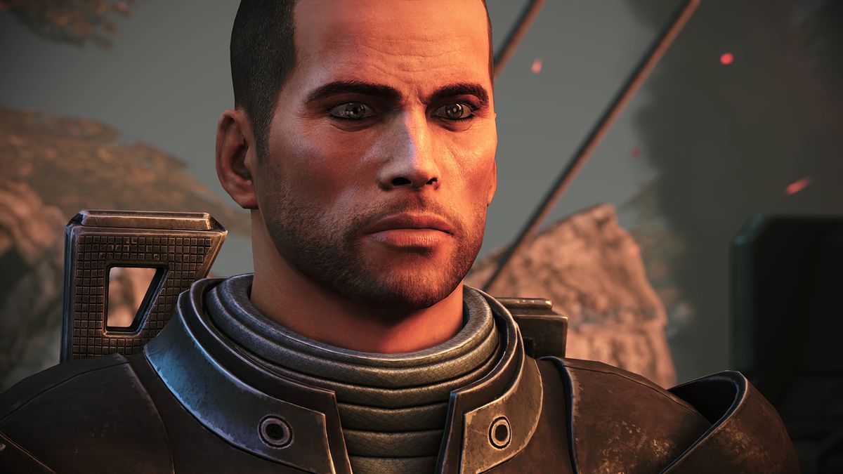 Mass Effect - Commander Shepard, a young, stern looking man, stands on Eden Prime
