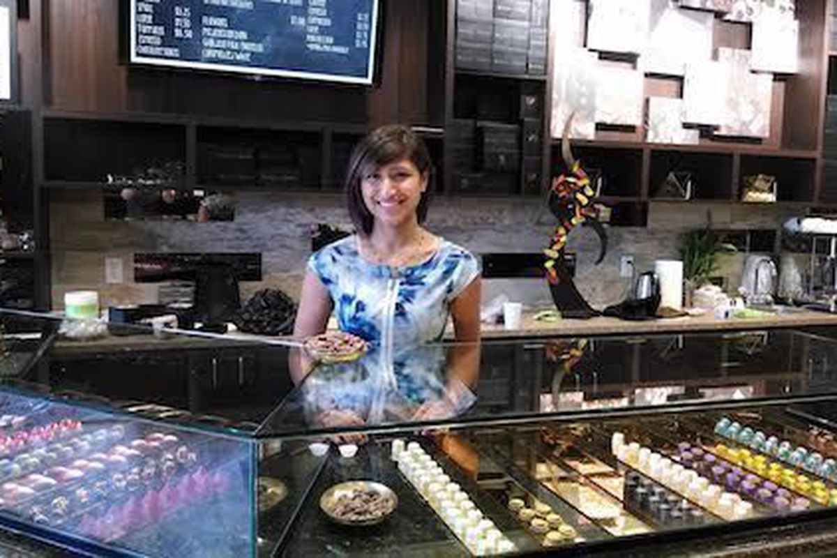 Owner Annie Rupani behind the counter at Cacao & Cardamom.