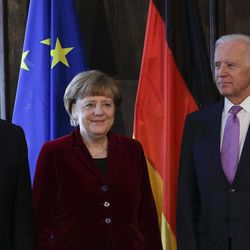 From left: Ukraine's  President Petro Poroshenko, German Chancellor Angela Merkel and U.S. Vice President Joe Biden pose for the media prior to a meeting during the 51.  Munich Security Conference in Munich, Germany, Saturday, Feb. 7, 2015. The conference on security policy takes place from Feb. 6, 2015 until Feb. 8, 2015. 