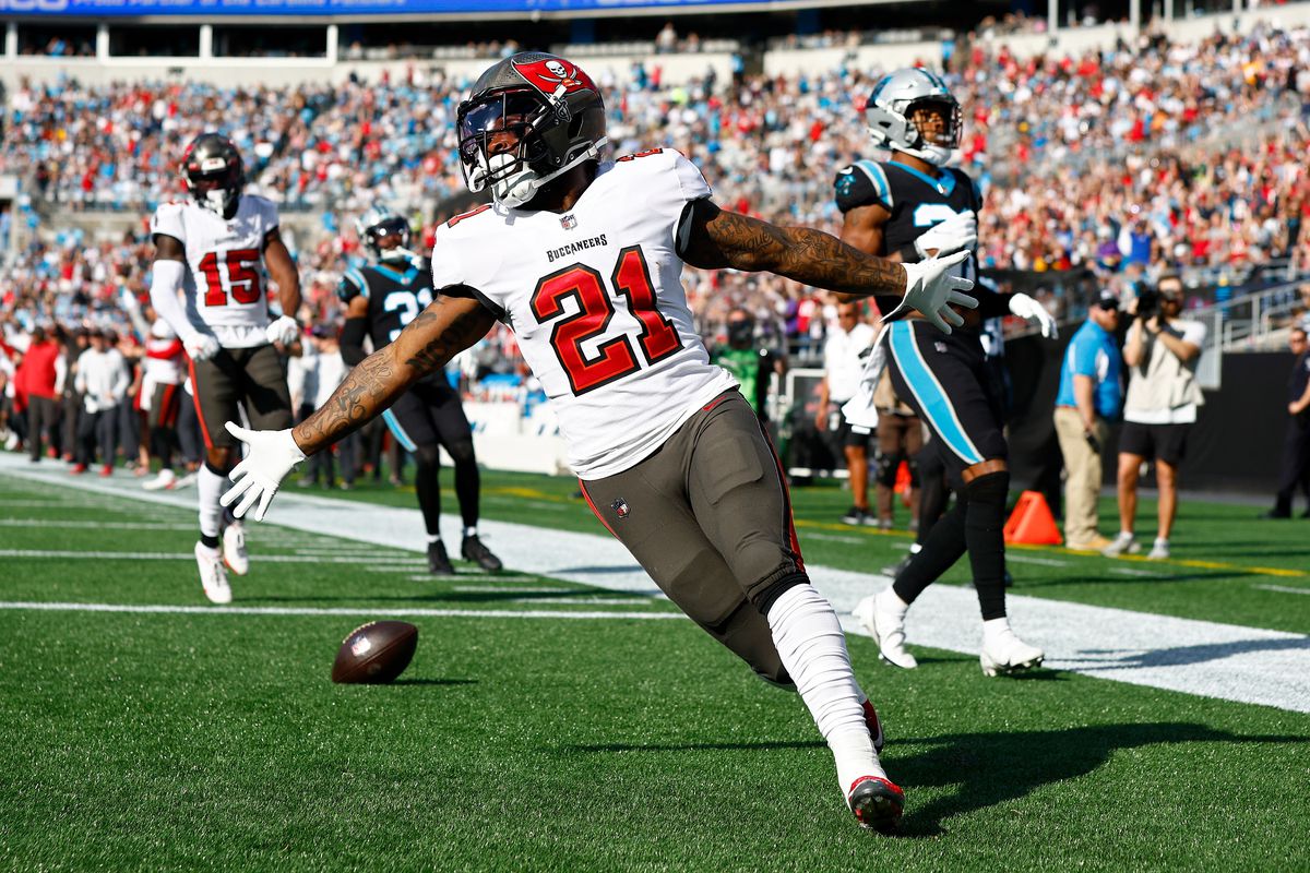 Ke’Shawn Vaughn #21 of the Tampa Bay Buccaneers celebrates a touchdown during the first quarter in the game against the Carolina Panthers at Bank of America Stadium on December 26, 2021 in Charlotte, North Carolina.