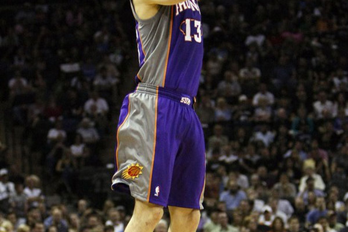 Apr 14, 2012; San Antonio, TX, USA; Phoenix Suns guard Steve Nash (13) shoots during the first half against the San Antonio Spurs at the AT&T Center. Mandatory Credit: Soobum Im-US PRESSWIRE