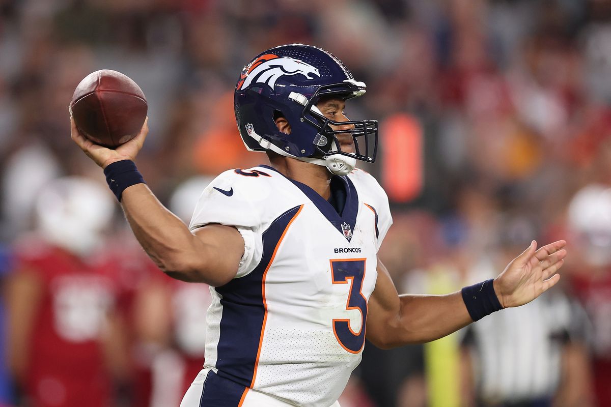 Quarterback Russell Wilson #3 of the Denver Broncos throws a pass during the NFL game at State Farm Stadium on August 11, 2023 in Glendale, Arizona. The Cardinals defeated the Broncos 18-17.