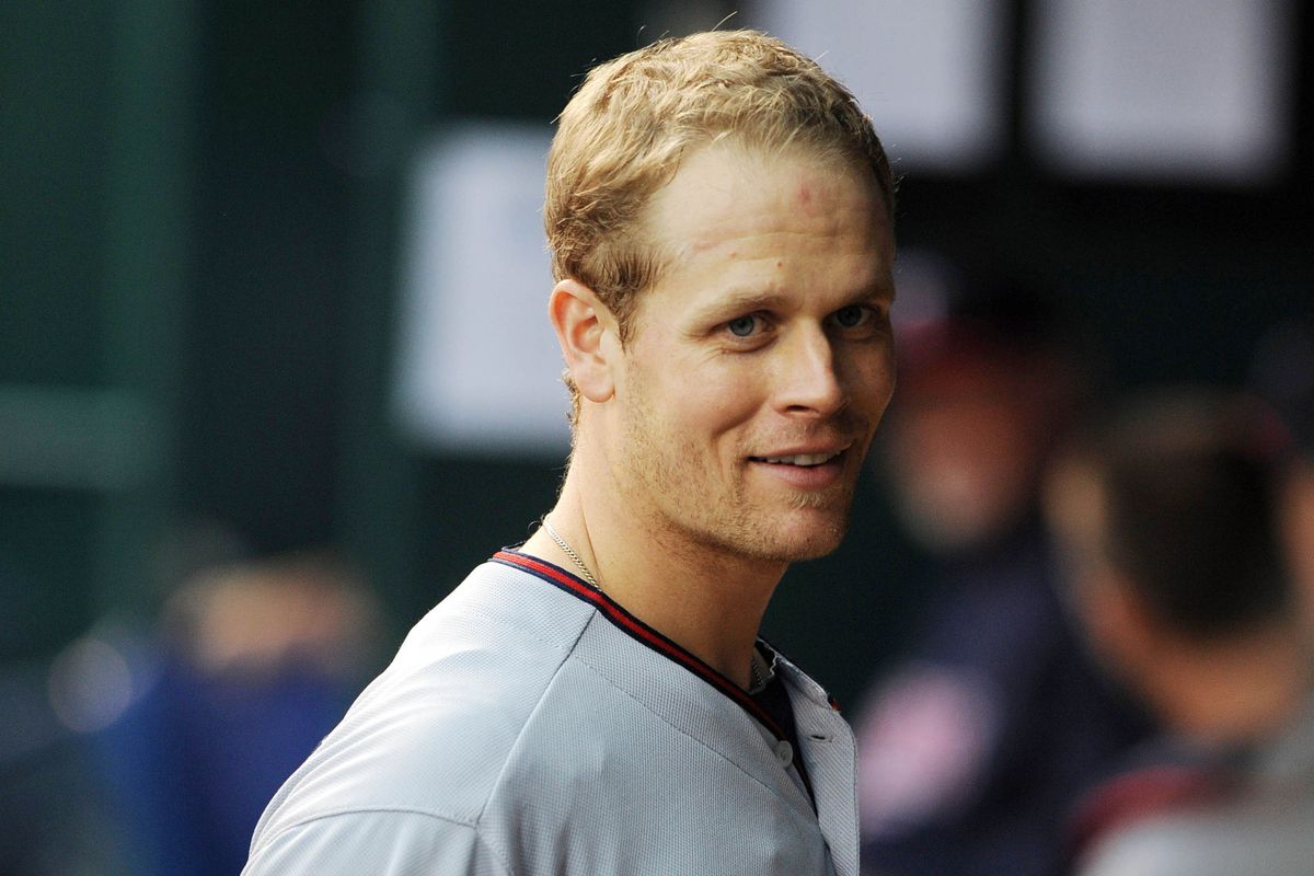 Just because...here's Justin Morneau before the game tonight--an actual kind-of smile!