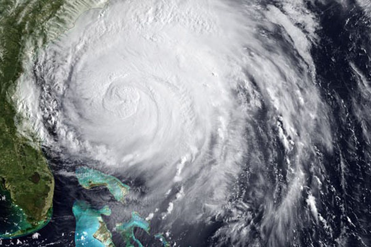 This satellite image taken at 12:45 GMT, Friday Aug. 26, 2011, shows Hurricane Irene as it moves northward along the U.S. eastern coastline. (NOAA)