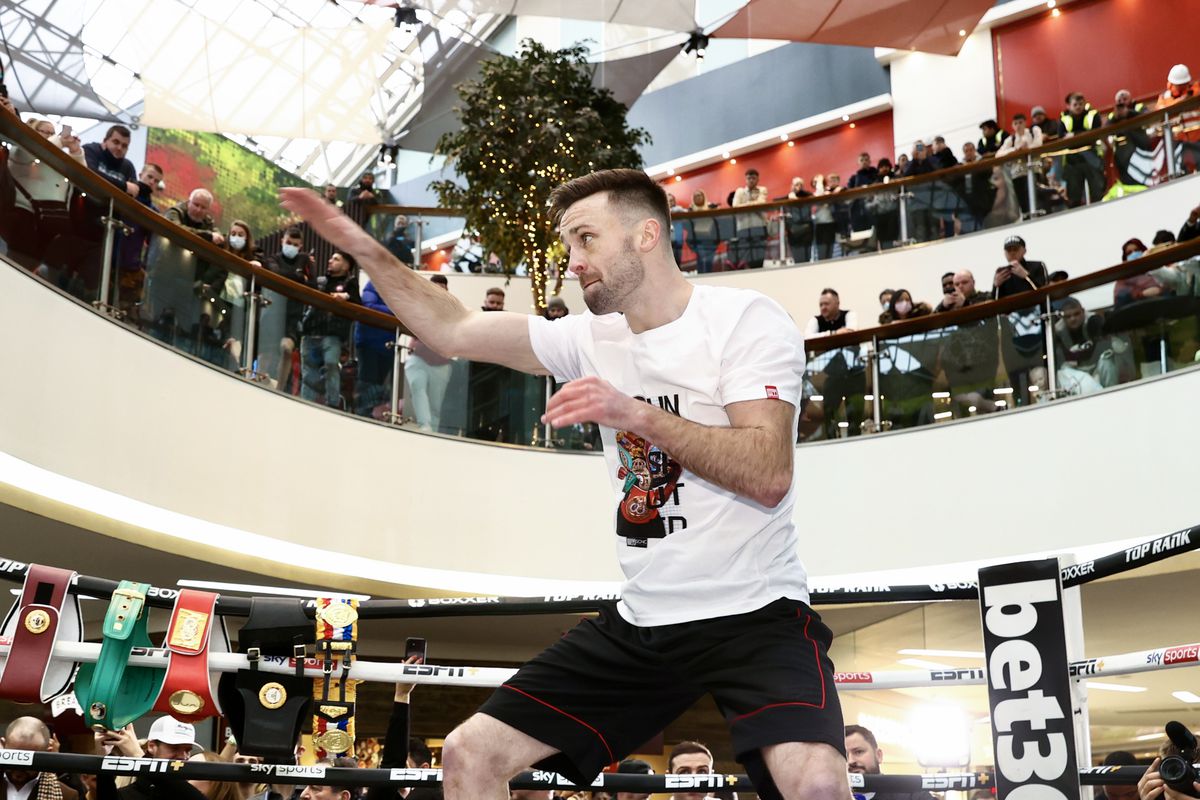 The undisputed champion Josh Taylor shadow boxes during the Josh Taylor v Jack Catterall open workout at St Enoch Square on February 23, 2022 in Glasgow, Scotland.