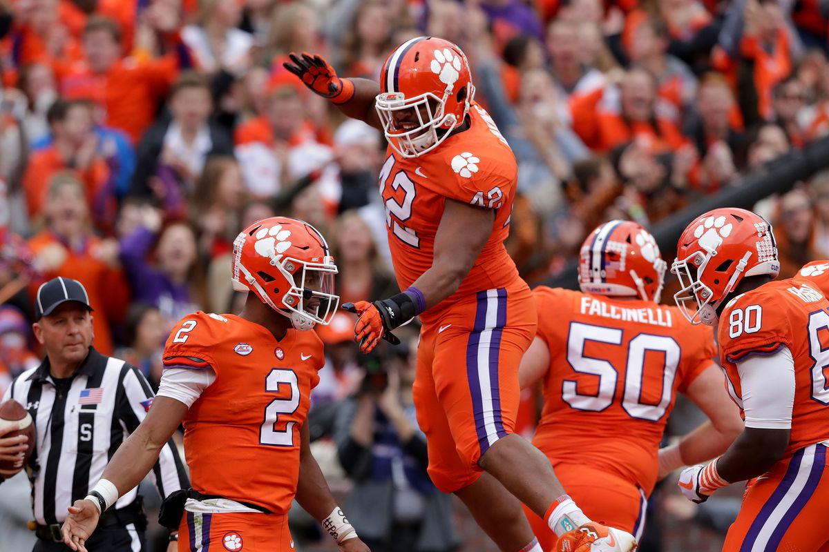 CLEMSON, SC - NOVEMBER 11:  Kelly Bryant #2 celebrates with teammate Christian Wilkins #42 of the Clemson Tigers after a touchdown against the Florida State Seminoles during their game at Memorial Stadium on November 11, 2017 in Clemson, South Carolina.  (Photo by Streeter Lecka/Getty Images)