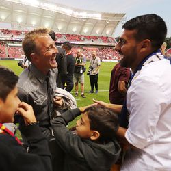 Former RSL player and head coach Jason Kreis talks with former player Javier Morales before Real Salt Lake and the LA Galaxy play at Rio Tinto Stadium in Sandy on Wednesday, Sept. 25, 2019. LA won 2-1.
