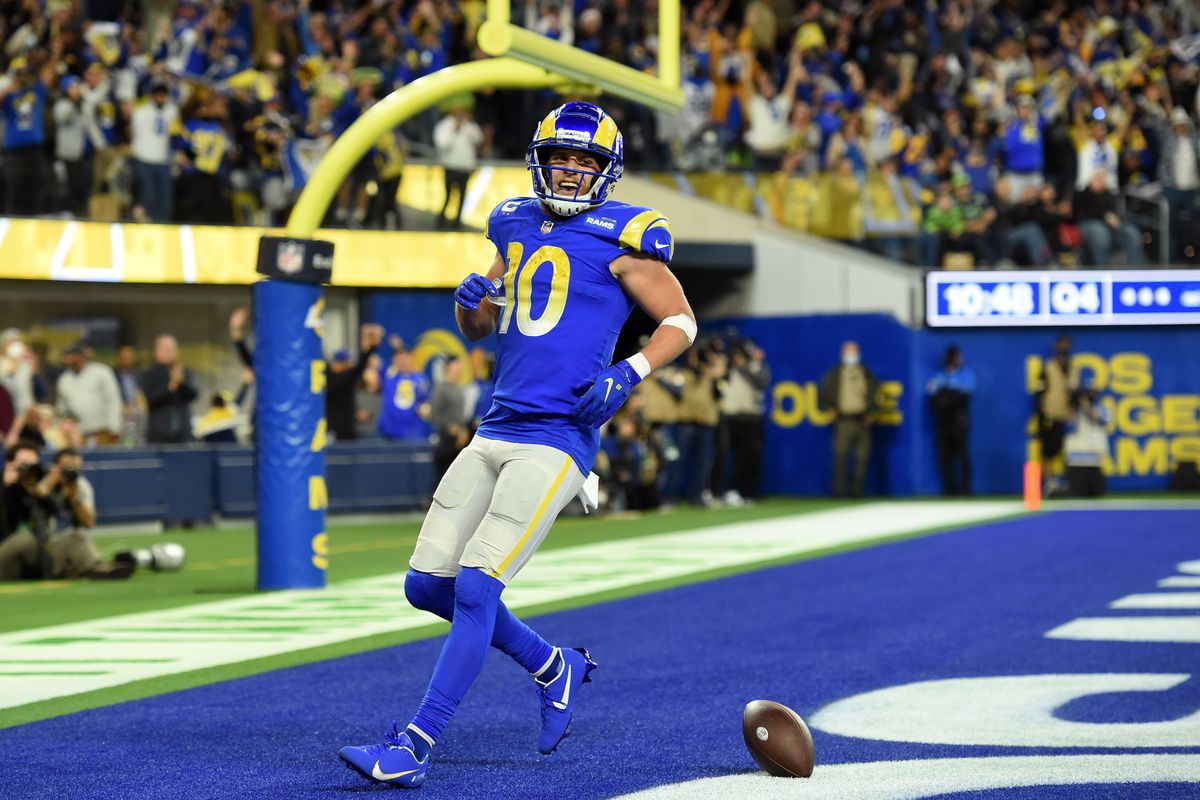 Los Angeles Rams Wide Receiver Cooper Kupp (10) runs the ball for a touchdown in the fourth quarter during an NFL game between the Seattle Seahawks and the Los Angeles Rams on December 21, 2021, at SoFi Stadium in Los Angeles, CA.