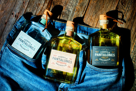 Bottles of tequila in jeans.